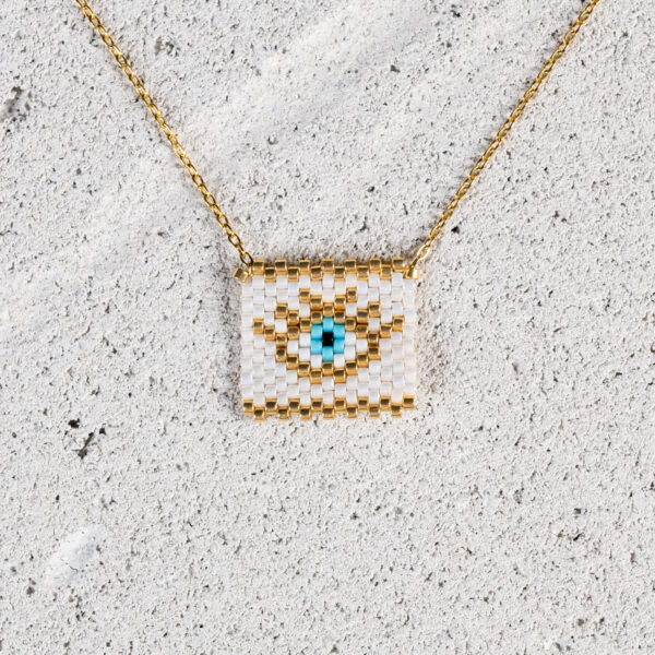 Γυναικείο κολιέ από ανοξείδωτο επιχρυσωμένο ατσάλι με ματάκι λευκό